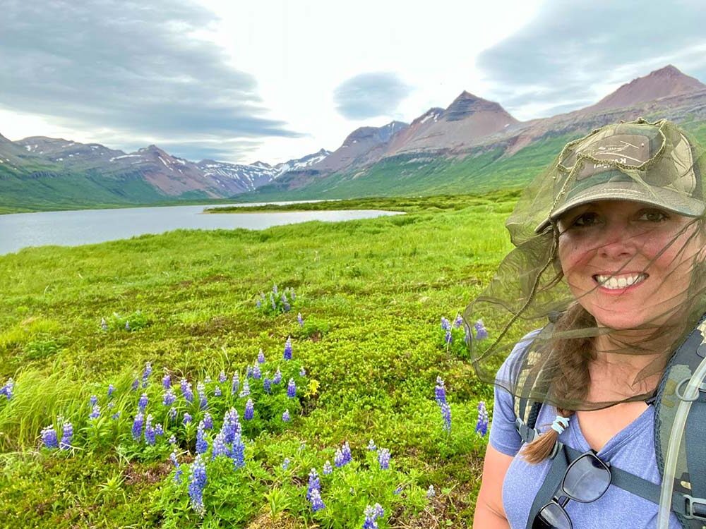 Man reading a book in bed.